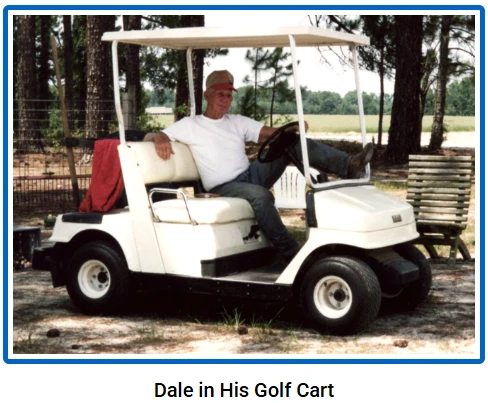 Dale Wilkinson relaxing in his golf cart at the farm.
